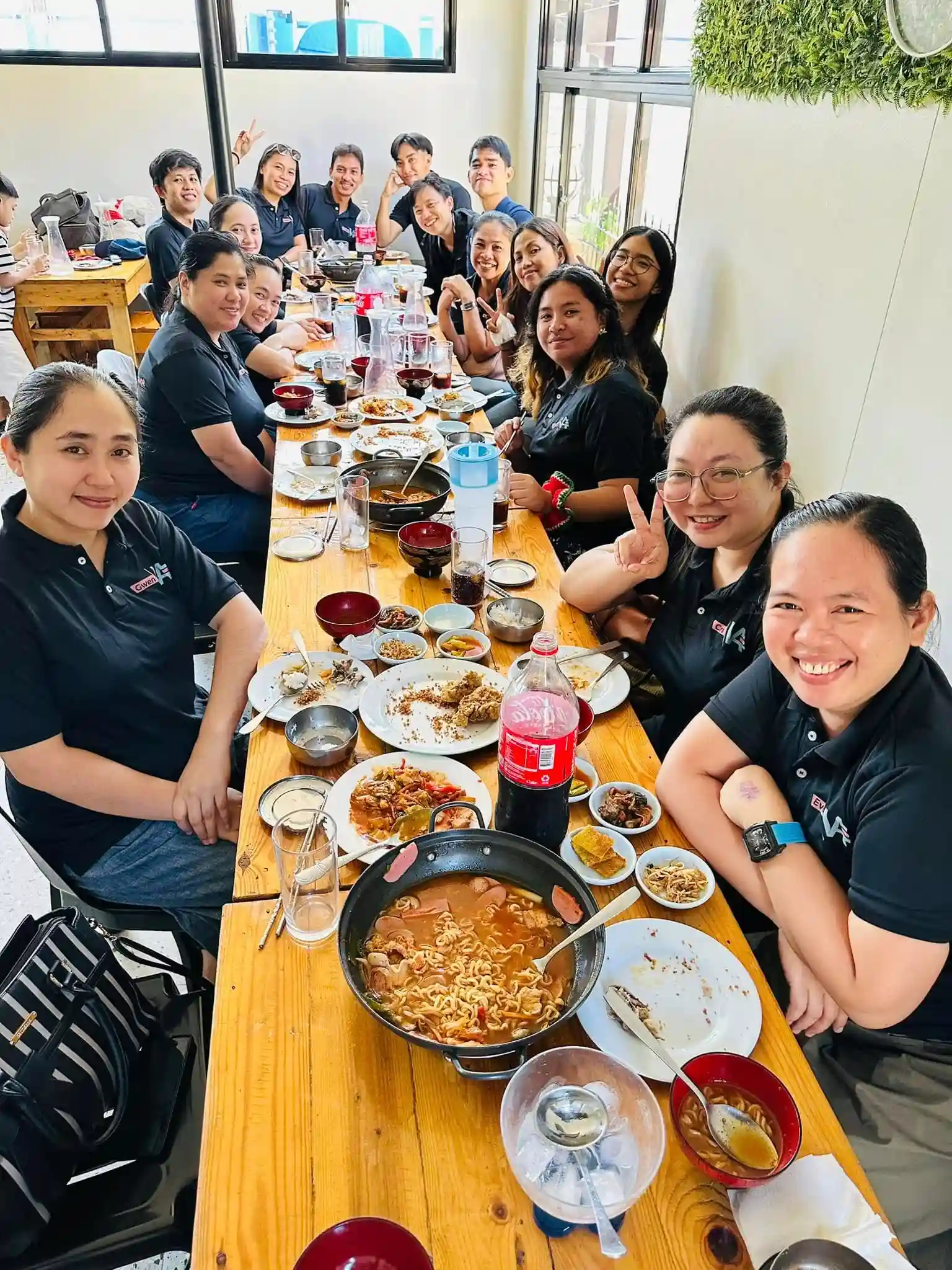 Virtually Assistant employee smiling and dining together.